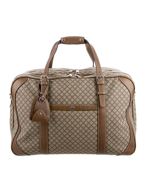 fake gucci carry on luggage|best Gucci luggage brand.